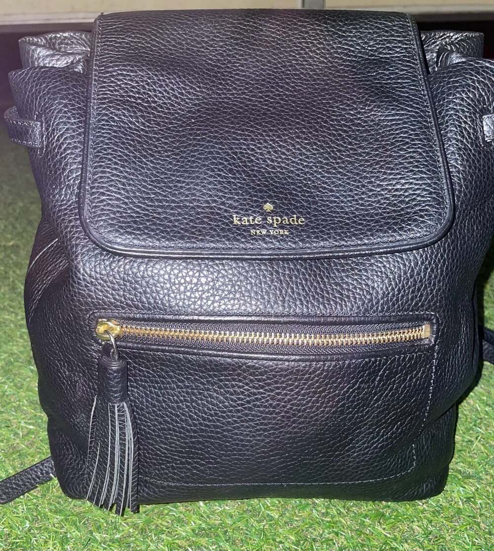Kate Spade New York Black Pebbled Leather Flap Backpack Tassel Gold Hardware
